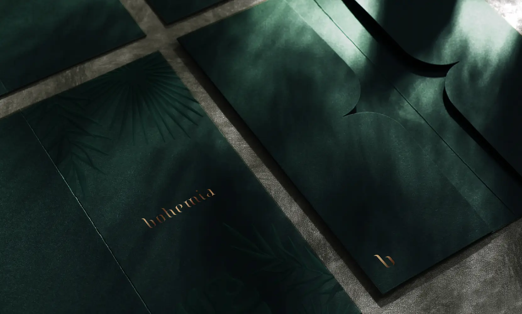 beautiful branding design with logos and dark green luxury elegant color tone